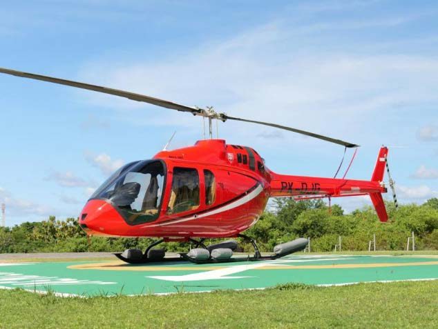 Bell 505 side profile on the helipad