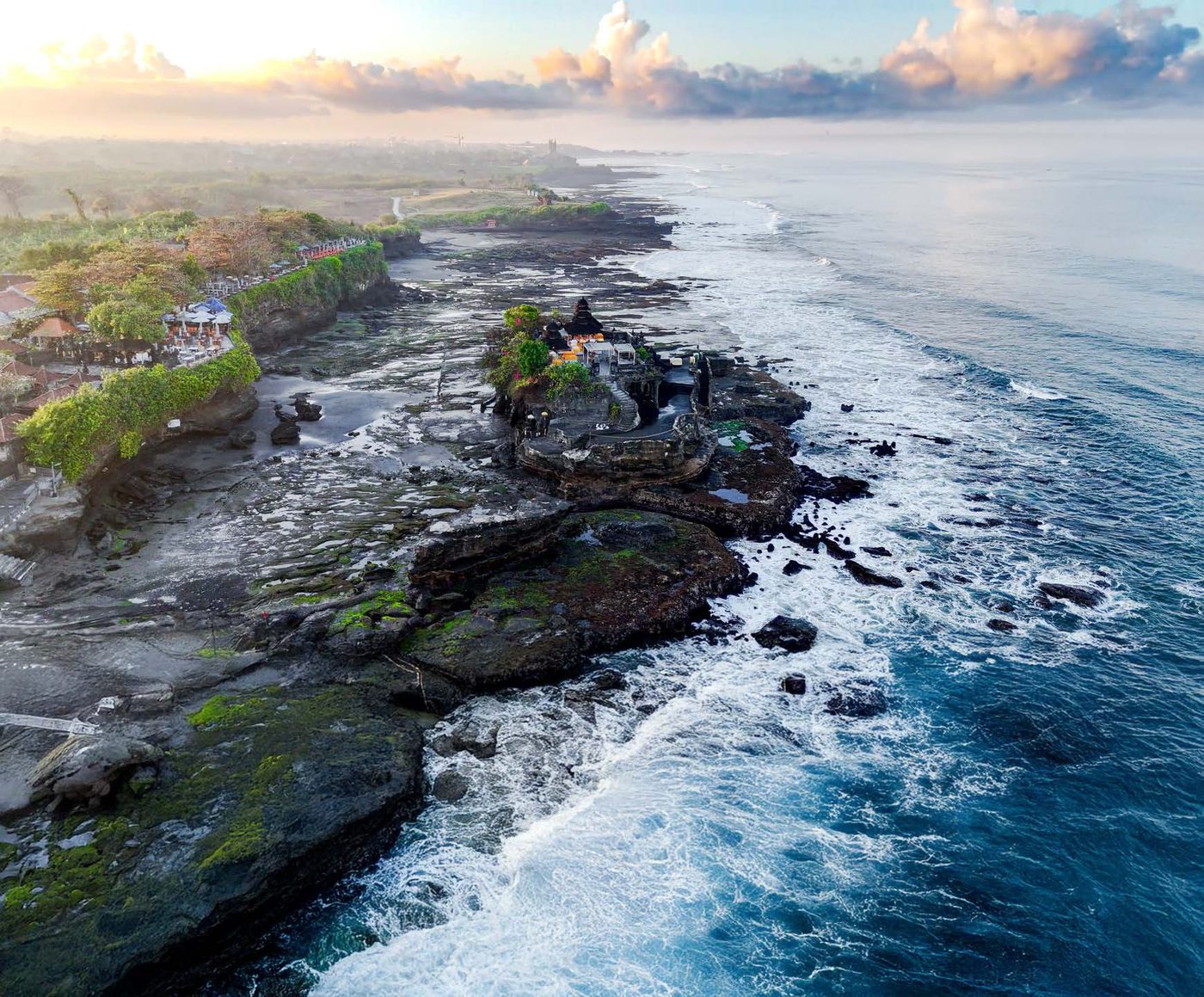 The sea temple of Tanah Lot on its rock shelf, seen from the air